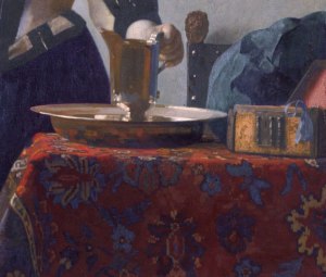 Vermeer_Donna-con-brocca-tavolo